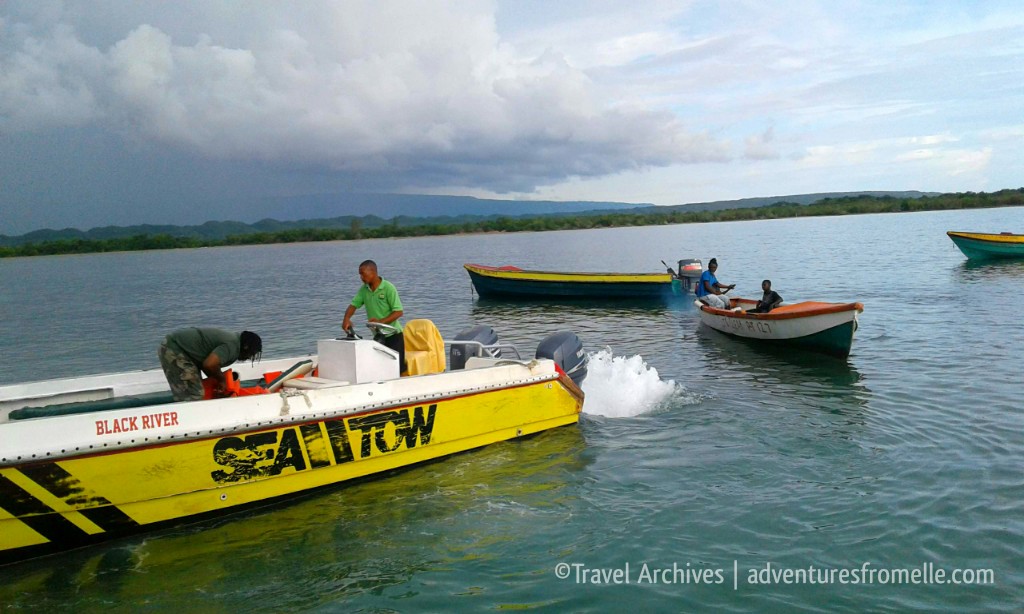 boats surrounding pelican bar