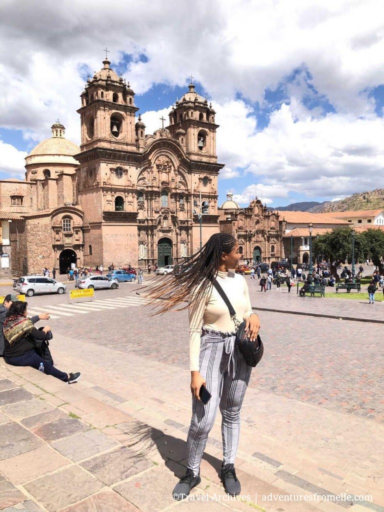 Girl does hair flip in Cusco city