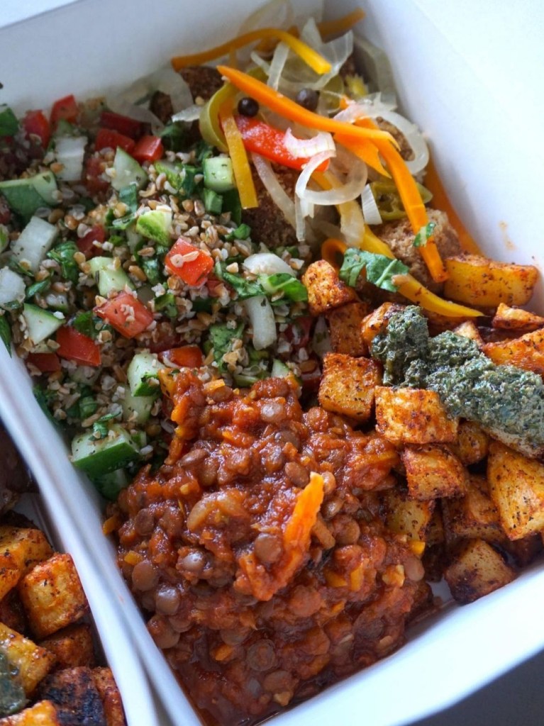 Close up of bean stew, salad and vegetables 