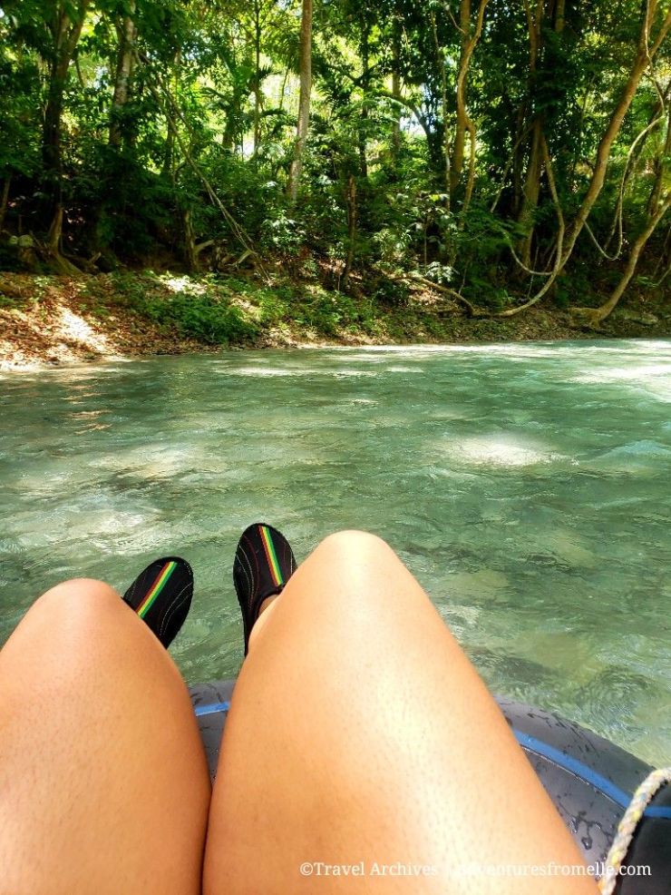 Girl tubing down White River