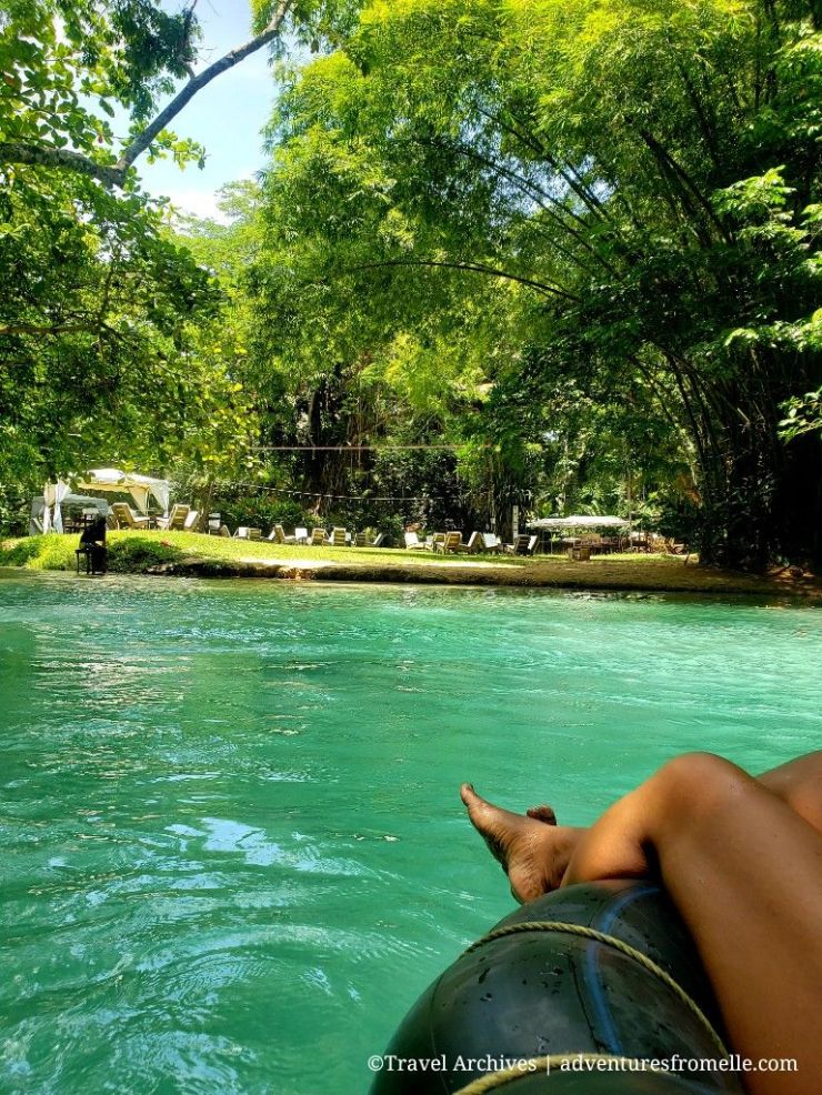 Girl tubing down White River