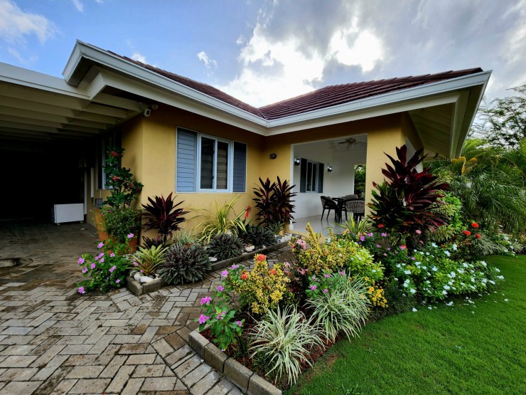 Exterior of home with garden