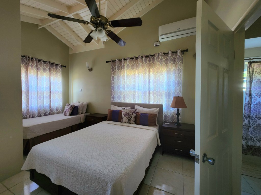 Bedroom with 2 beds at Escape Vista