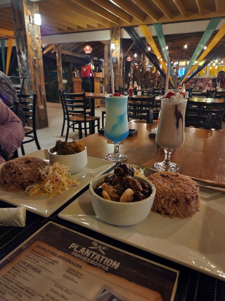 Oxtail and beans with drinks in background