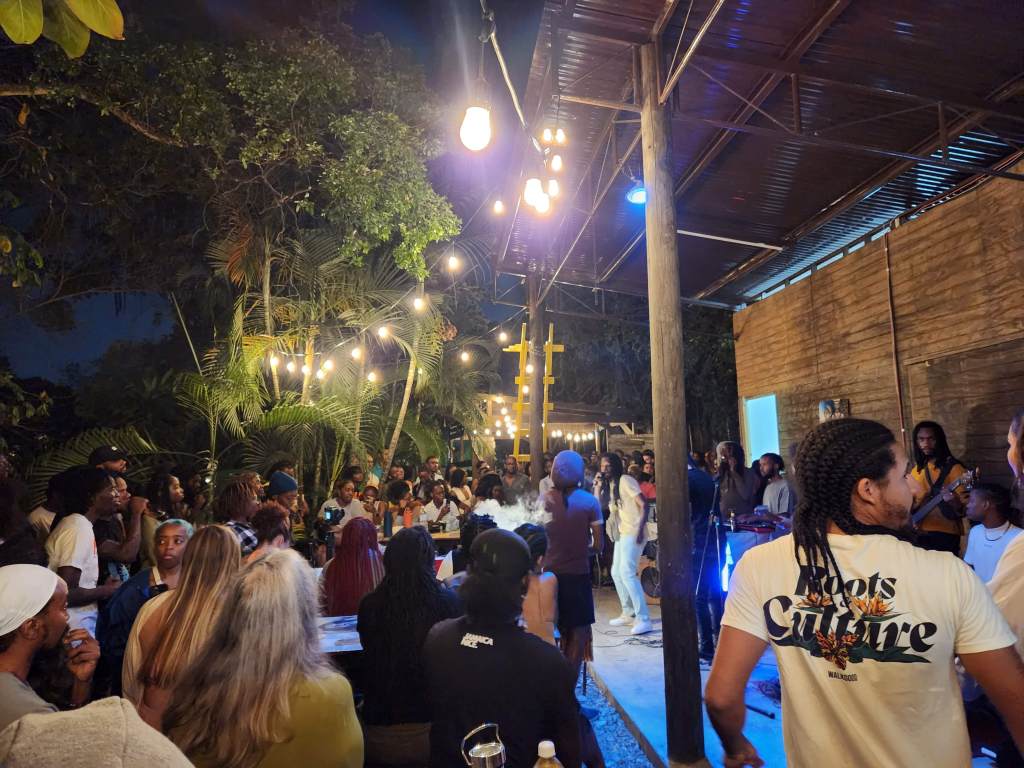 Gathering of people around performer on stage